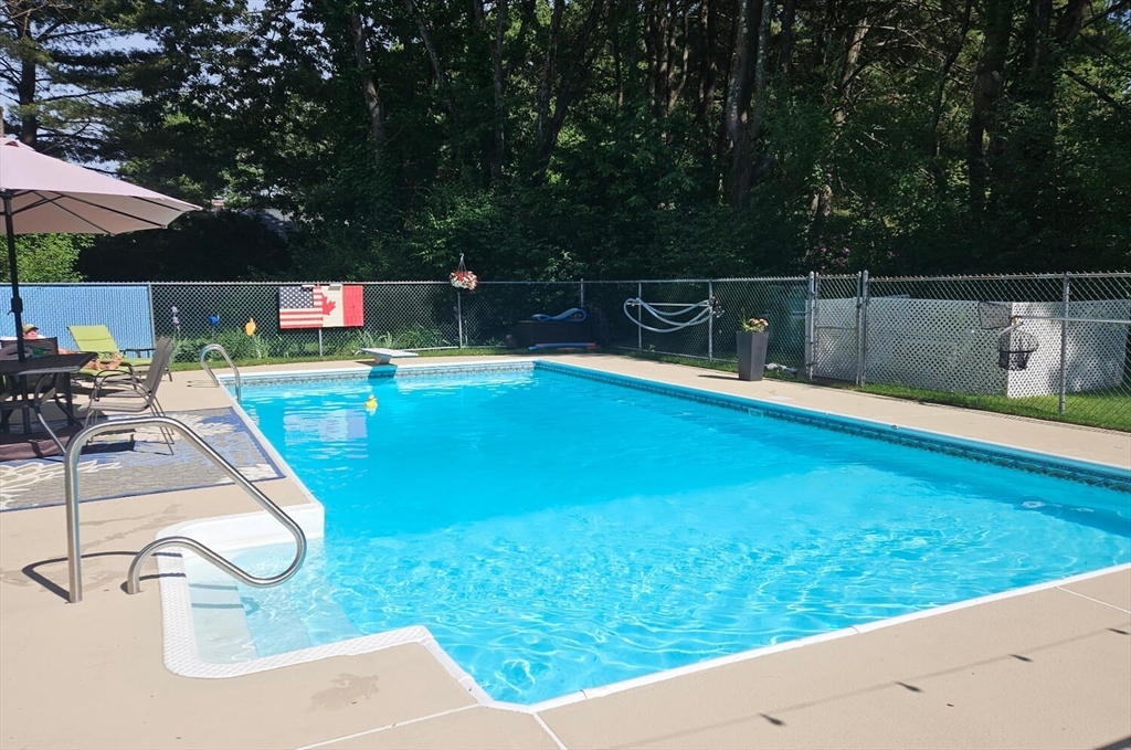 1 Woodside Road Framingham, MA 01701 - Photo 33 of 41 swimming pool view with a seating space