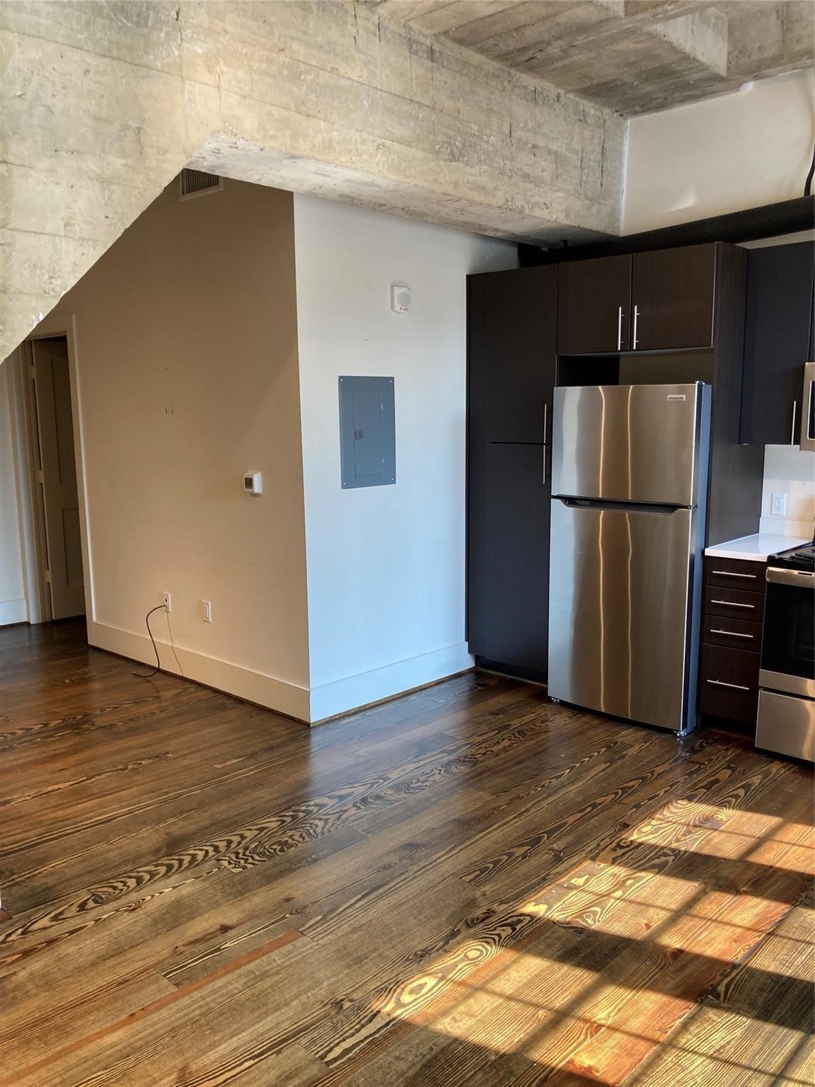 4411 Dallas Street, Unit 3 Houston, TX 77023 - Photo 5 of 12 a view of a kitchen with a refrigerator