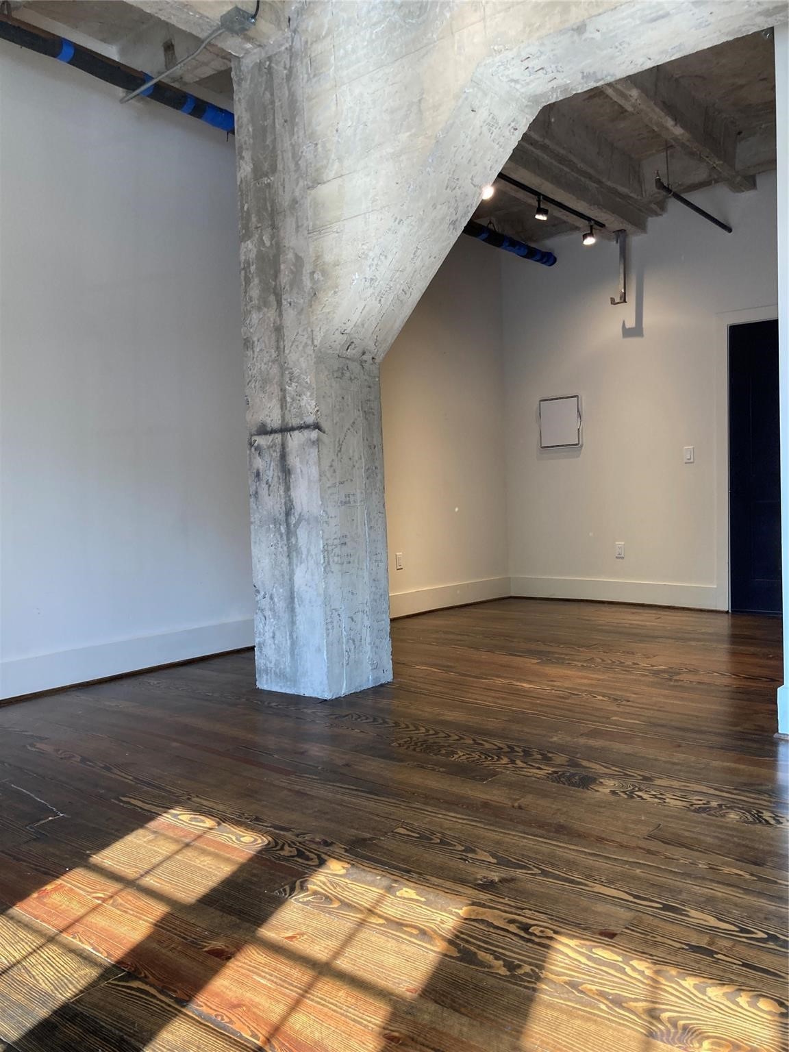 4411 Dallas Street, Unit 3 Houston, TX 77023 - Photo 10 of 12 a view of wooden floor in an empty room