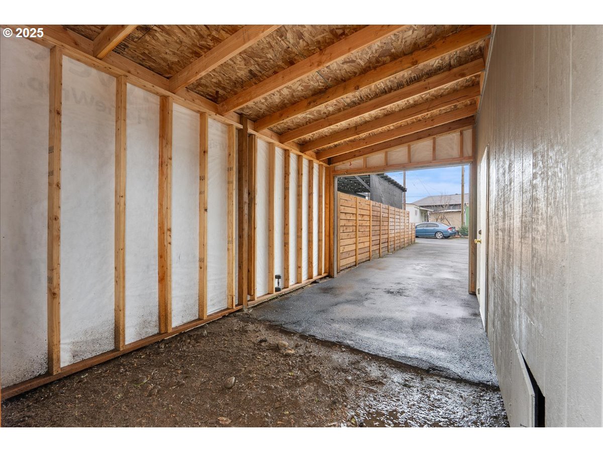 8951 Southeast Fuller Road, Unit 36 Happy Valley, OR 97086 - Photo 18 of 27 a view of a room with wooden walls