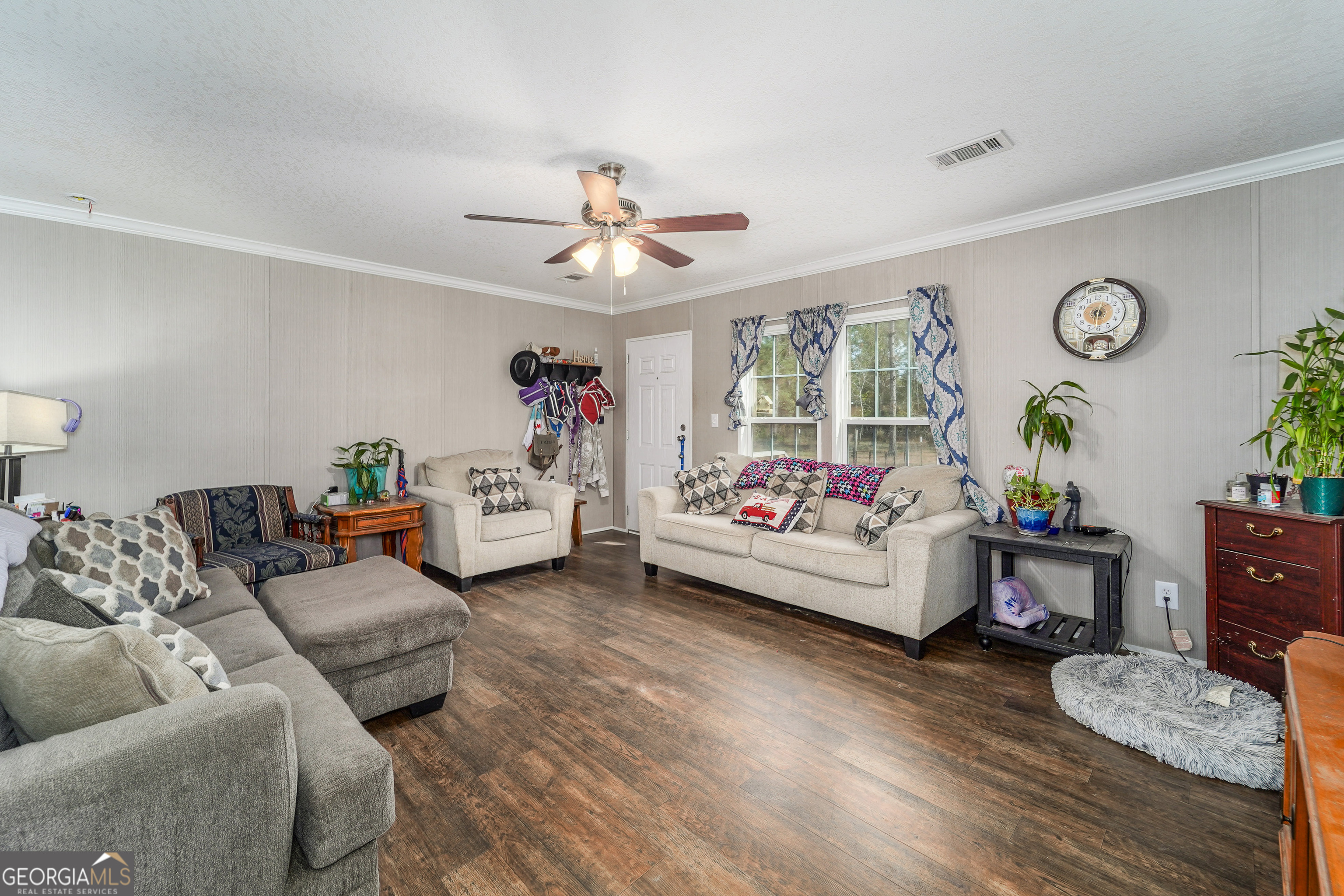 6911 Old Hortense Road Hortense, GA 31543 - Photo 19 of 19 a living room with furniture and wooden floor