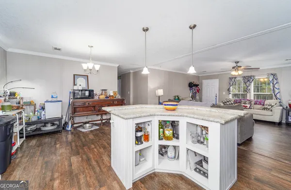 a view of a kitchen and living room