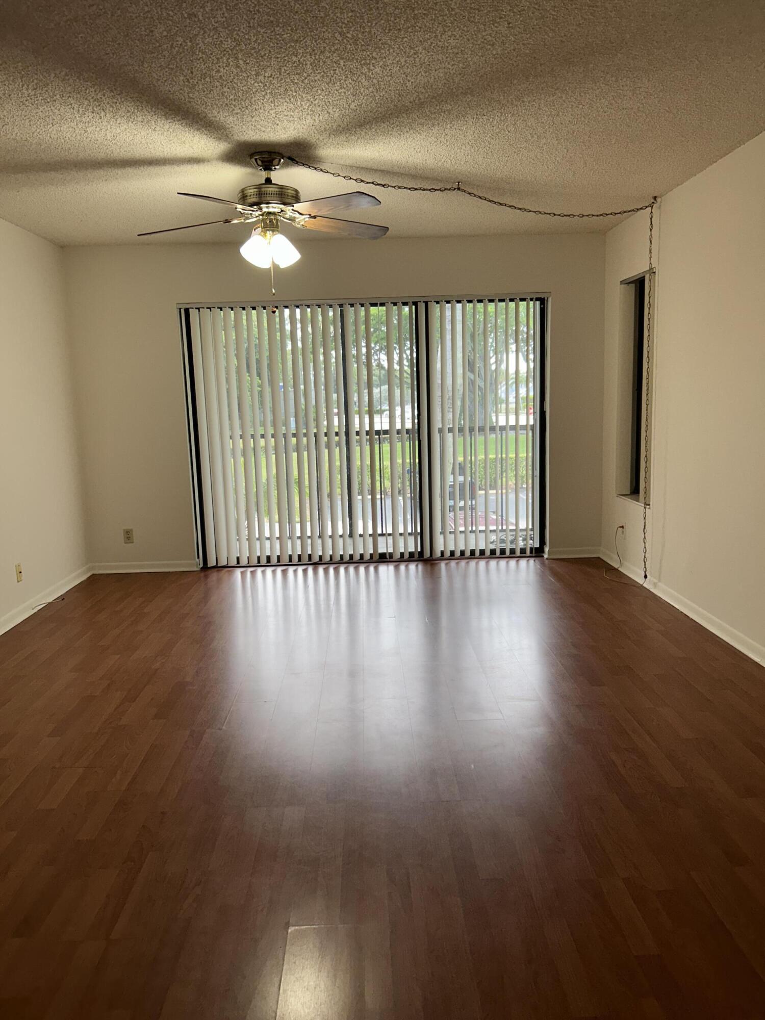 1003 Green Pine Boulevard, Unit E2 West Palm Beach, FL 33409 - Photo 6 of 13 IMG_4967