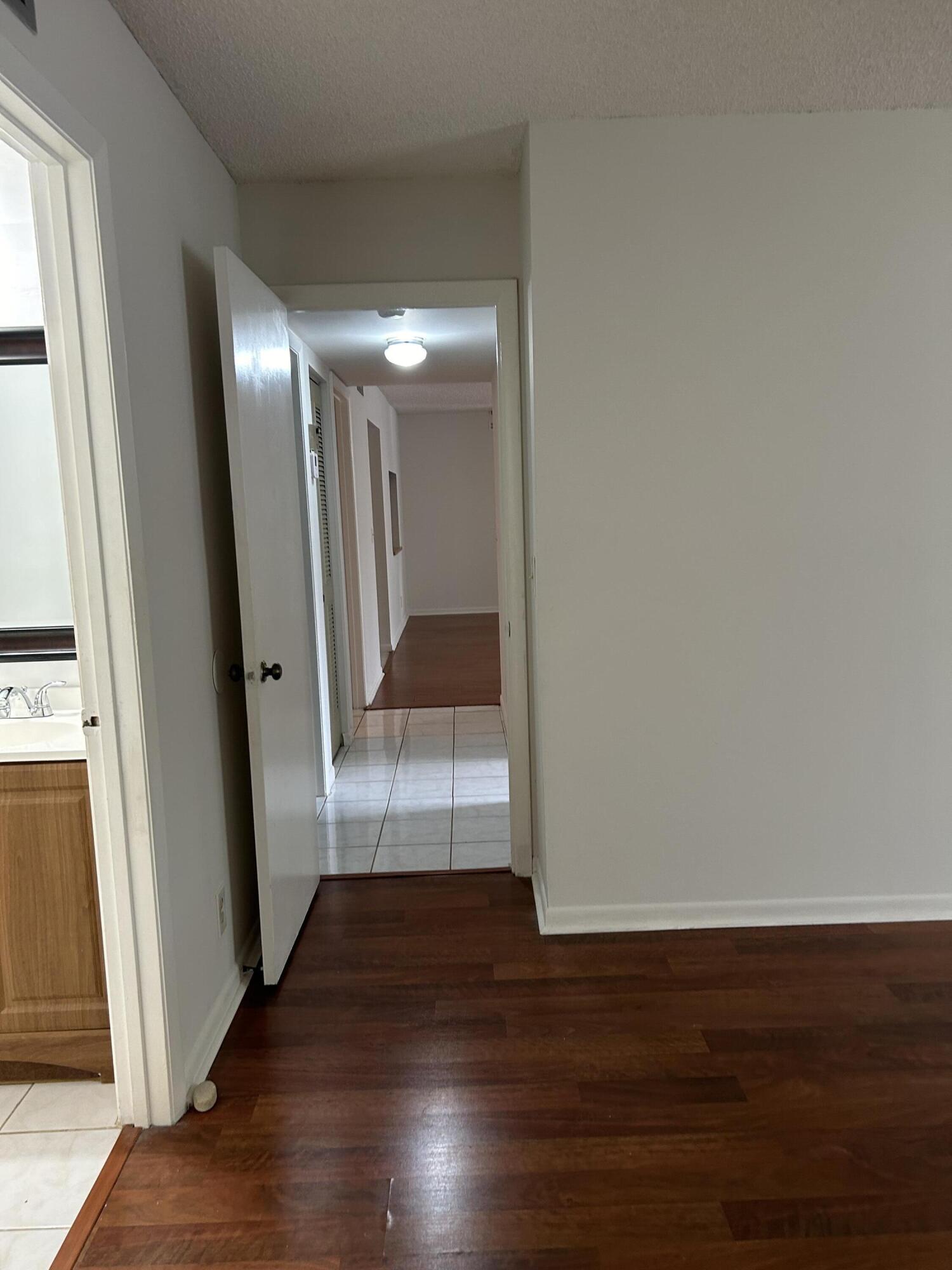 1003 Green Pine Boulevard, Unit E2 West Palm Beach, FL 33409 - Photo 7 of 13 IMG_4981