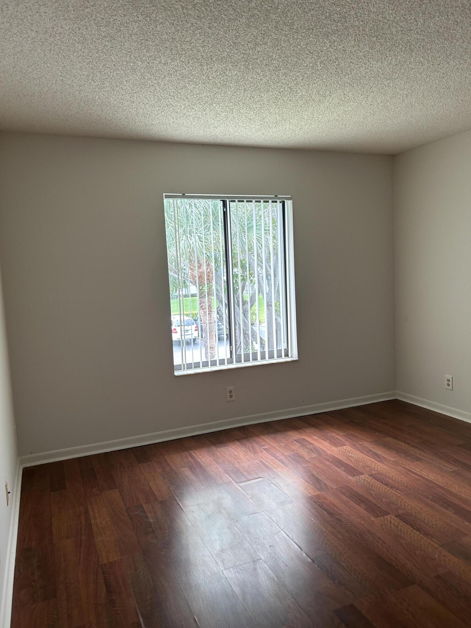 1003 Green Pine Boulevard, Unit E2 West Palm Beach, FL 33409 - Photo 8 of 13 IMG_4976