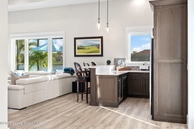 a spacious bathroom with a granite countertop sink mirror and