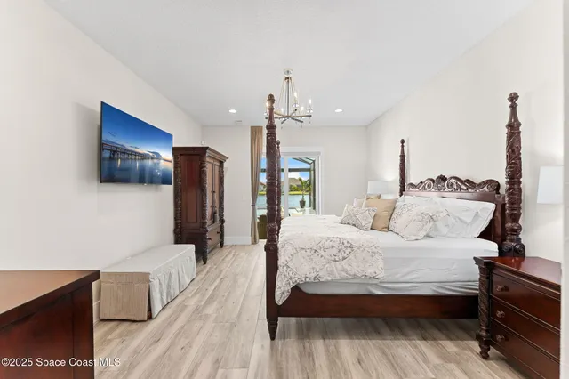 a view of a swimming pool with a lounge chair