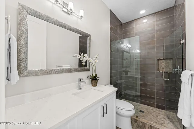 a view of a house with swimming pool and porch with furniture