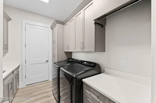 an aerial view of a house with a yard swimming pool and outdoor seating