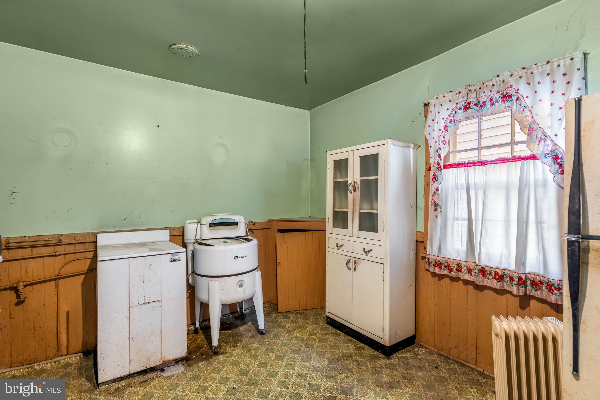 169 East Main Street Orange, VA 22960 - Photo 12 of 27 a utility room with dryer and washer