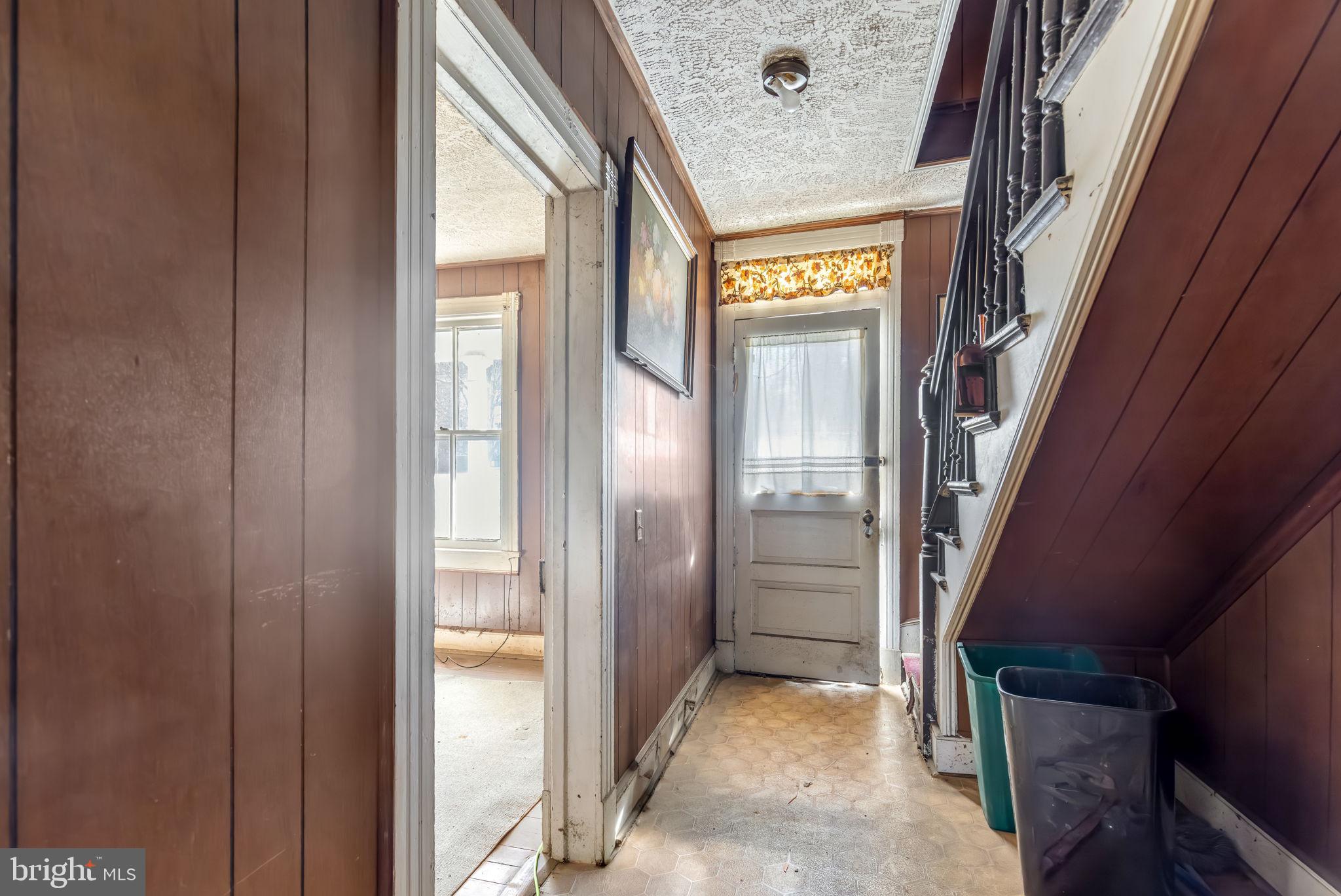 169 East Main Street Orange, VA 22960 - Photo 5 of 27 a view of an entryway with a floor