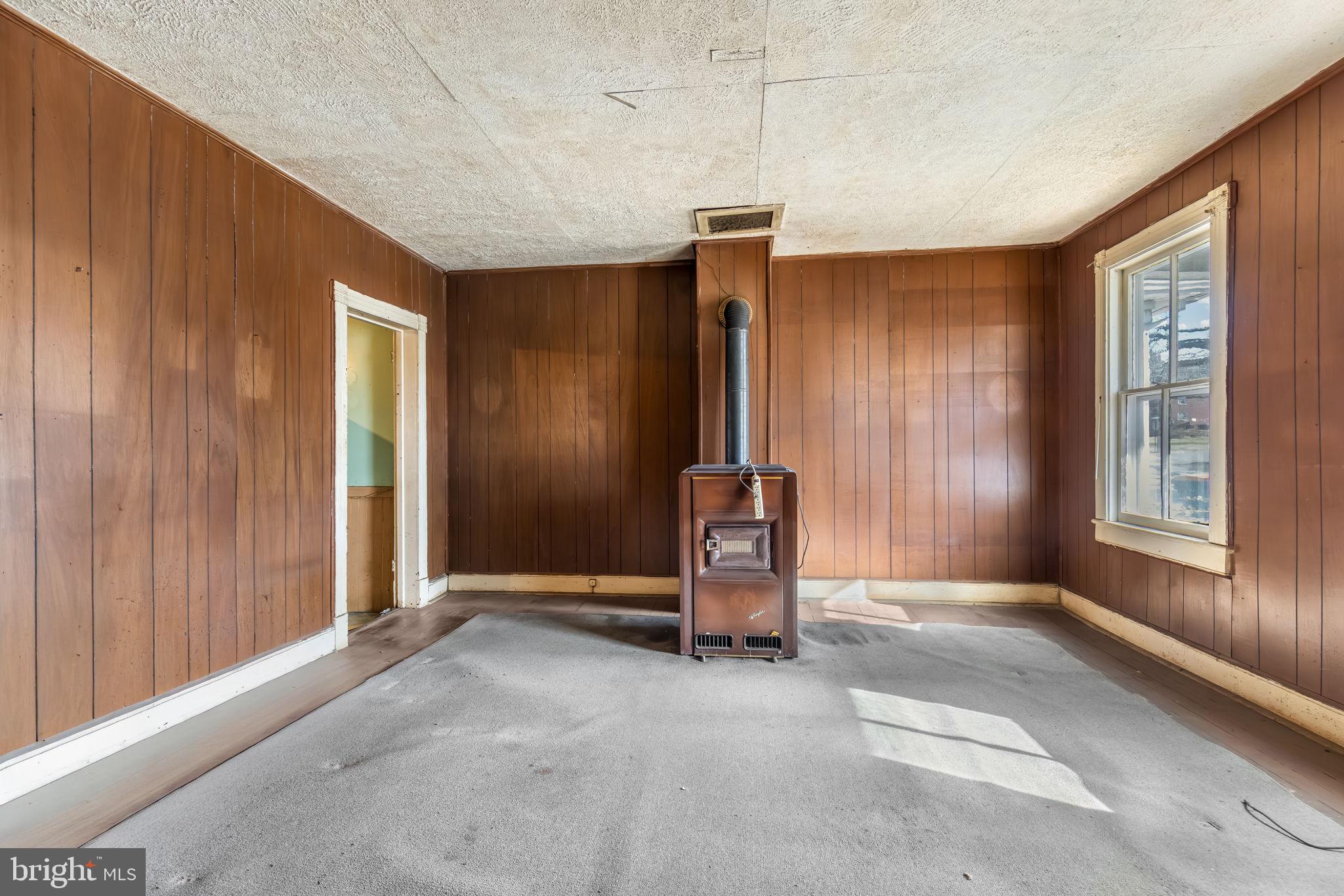 169 East Main Street Orange, VA 22960 - Photo 6 of 27 an empty room with windows