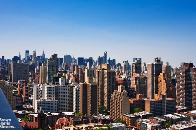 a view of a balcony with chairs