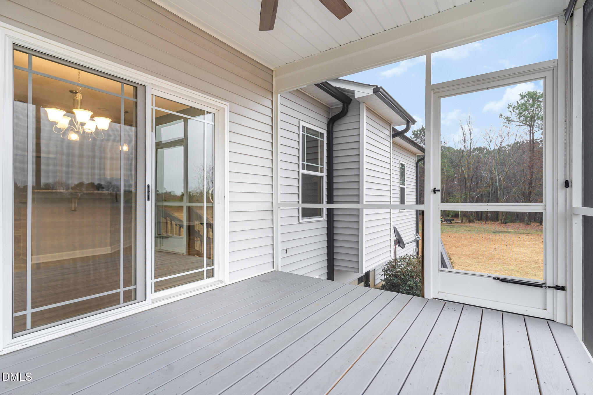 88 Bodacious Lane Benson, NC 27504 - Photo 28 of 32 a view of a balcony with wooden floor and door