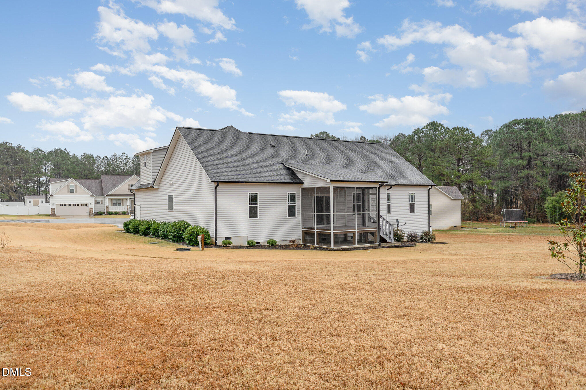 88 Bodacious Lane Benson, NC 27504 - Photo 31 of 32 a view of a house with a yard