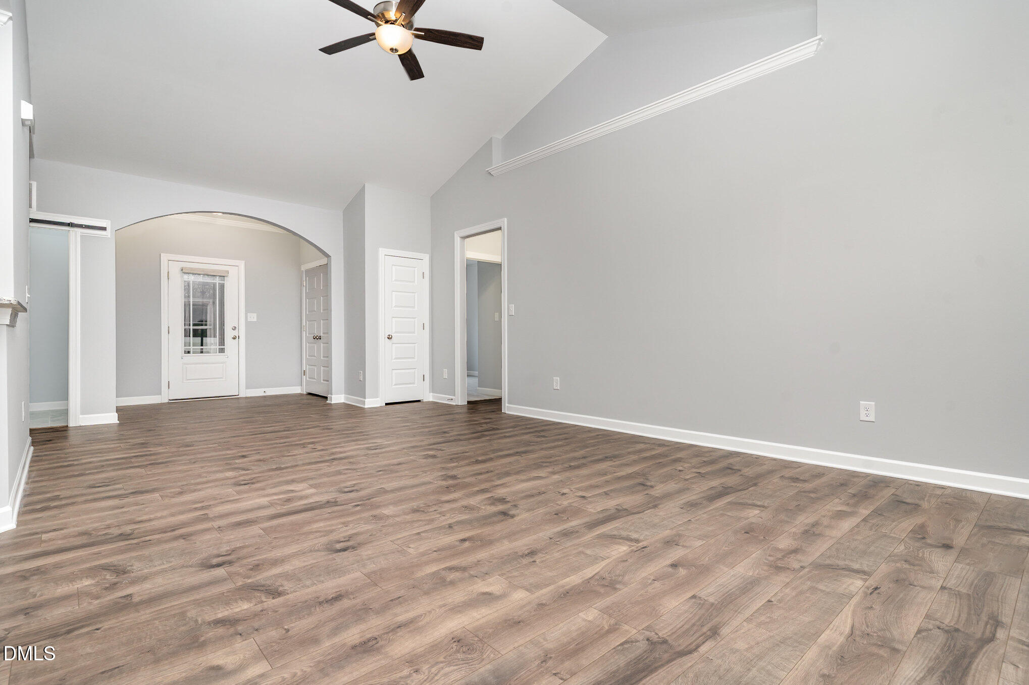 88 Bodacious Lane Benson, NC 27504 - Photo 8 of 32 an empty room with fan and ceiling fan