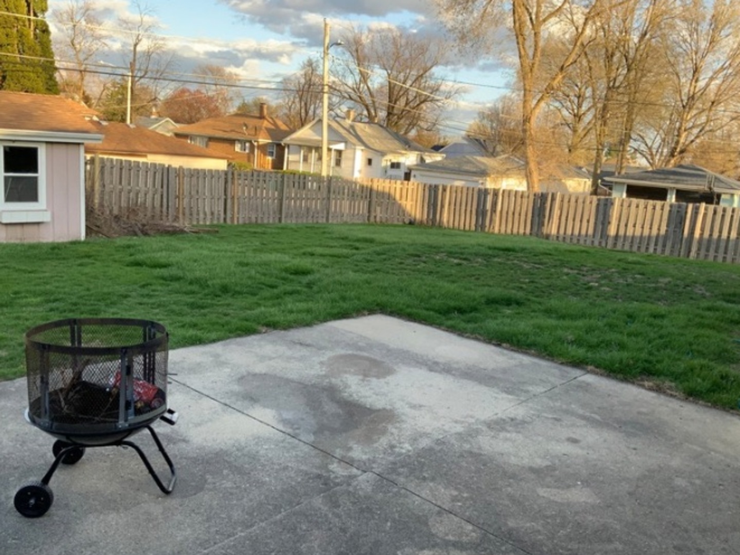 1100 Frederick Street Joliet, IL 60435 - Photo 9 of 10 a view of a patio with a table and a chairs