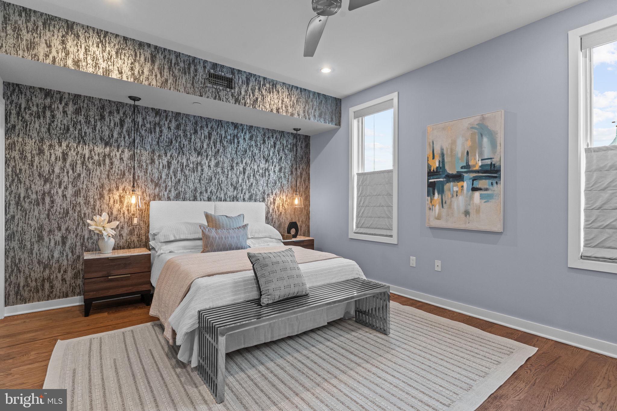 412 Moyer Street, Unit 7 Philadelphia, PA 19125 - Photo 24 of 55 a bedroom with a bed and a night stand