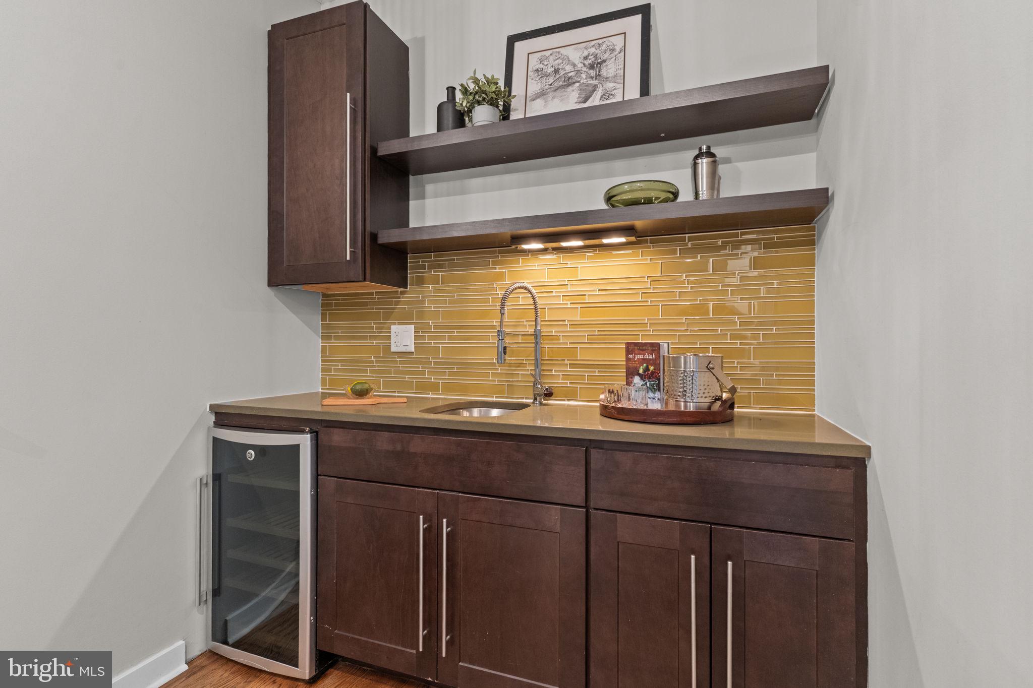 412 Moyer Street, Unit 7 Philadelphia, PA 19125 - Photo 31 of 55 a sink with a cabinets
