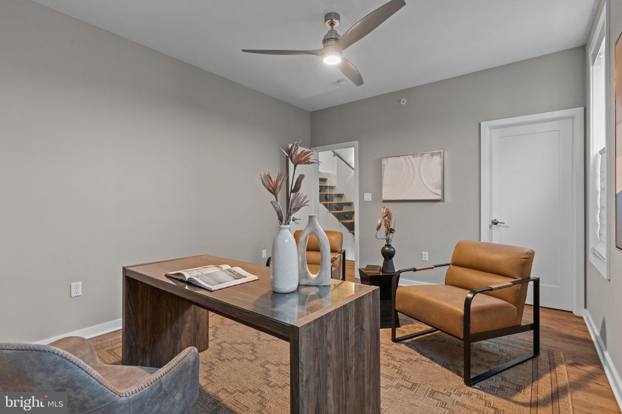 412 Moyer Street, Unit 7 Philadelphia, PA 19125 - Photo 33 of 55 a living room with furniture and a table