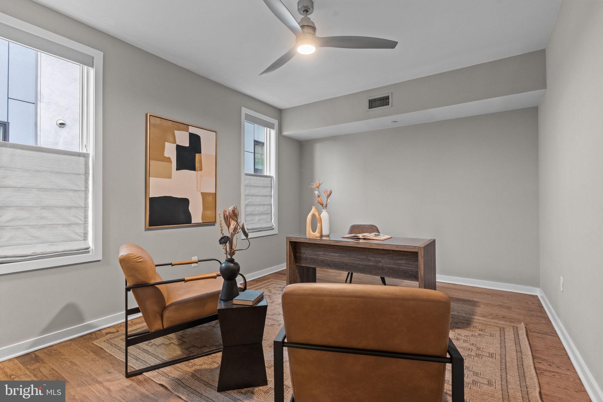 412 Moyer Street, Unit 7 Philadelphia, PA 19125 - Photo 35 of 55 a living room with furniture and a rug