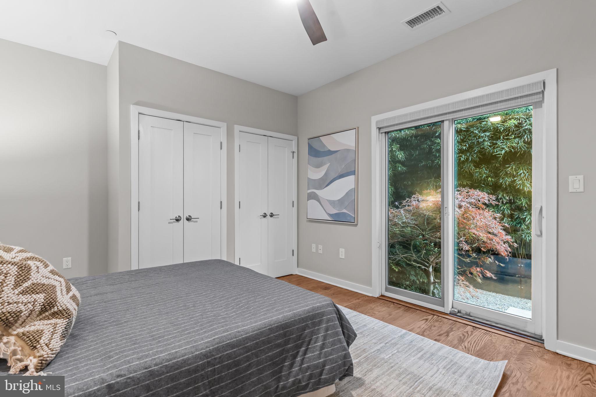 412 Moyer Street, Unit 7 Philadelphia, PA 19125 - Photo 7 of 55 a bedroom with a large bed and a window