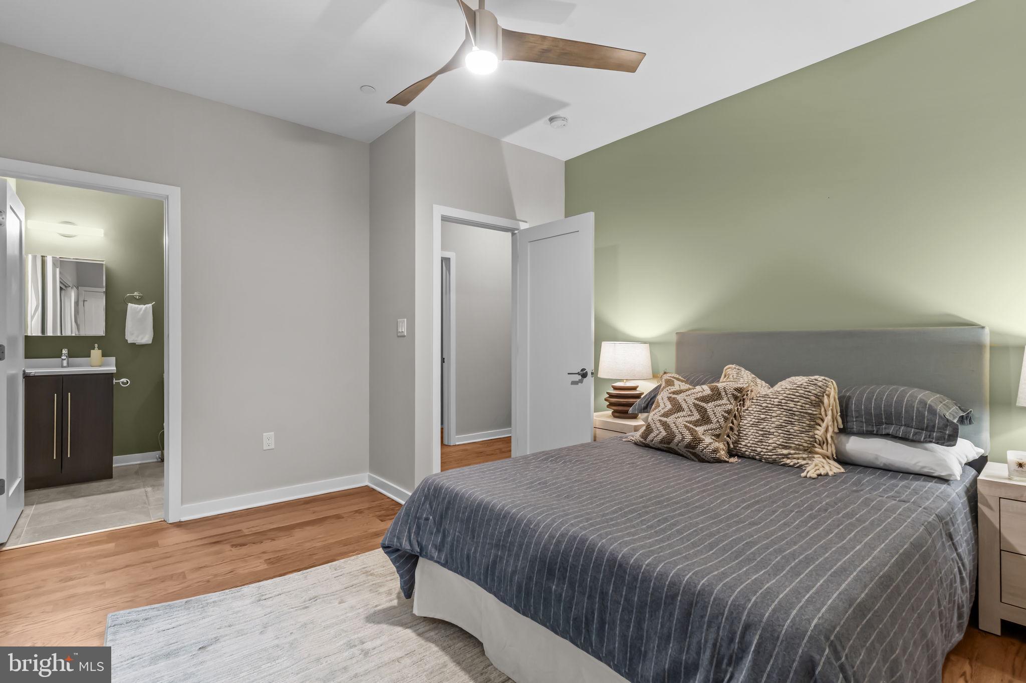 412 Moyer Street, Unit 7 Philadelphia, PA 19125 - Photo 8 of 55 a bedroom with a bed and a lamp