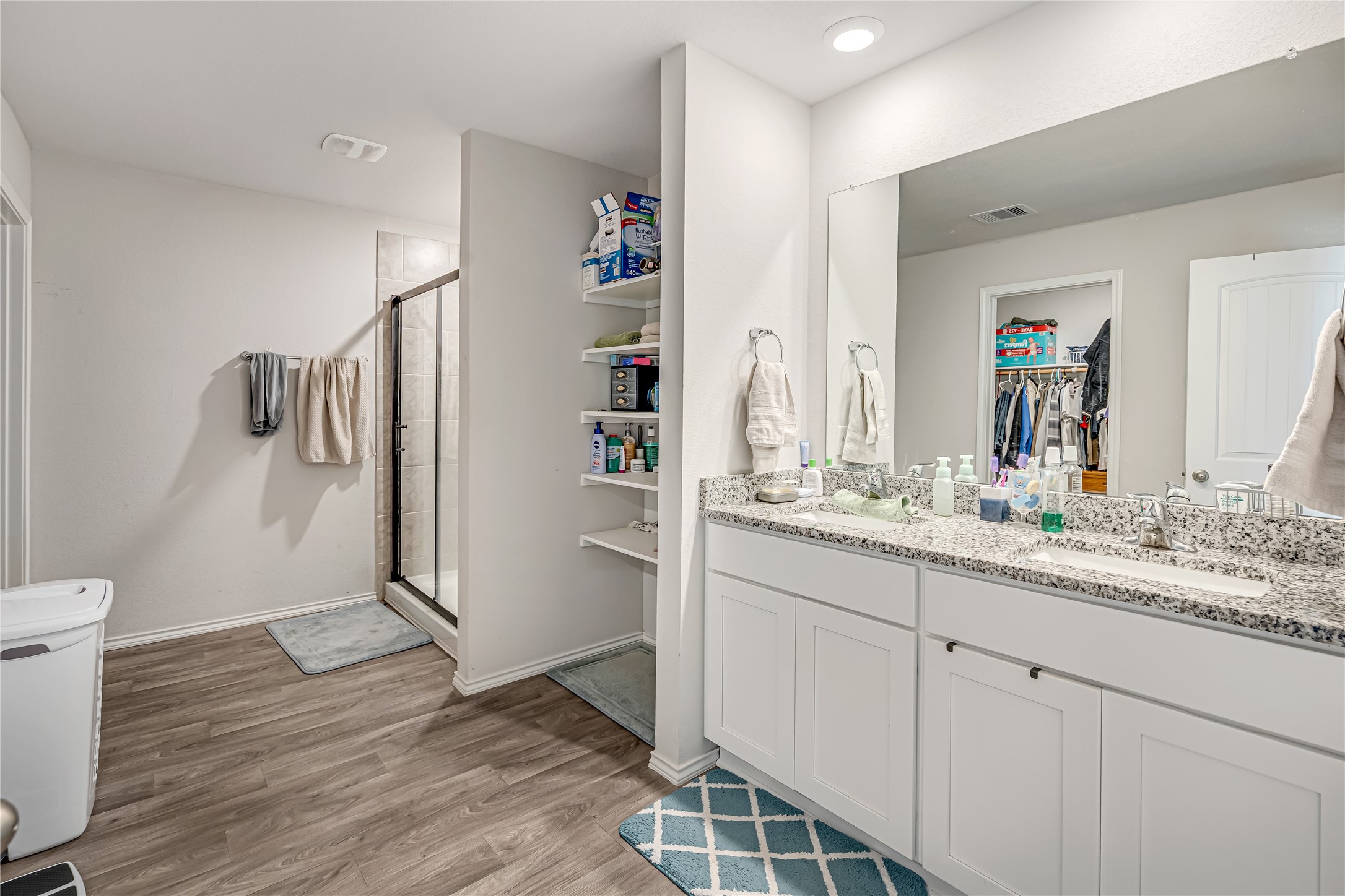 8022 Front Nine Lane Navasota, TX 77868 - Photo 16 of 30 a bathroom with a sink and a mirror