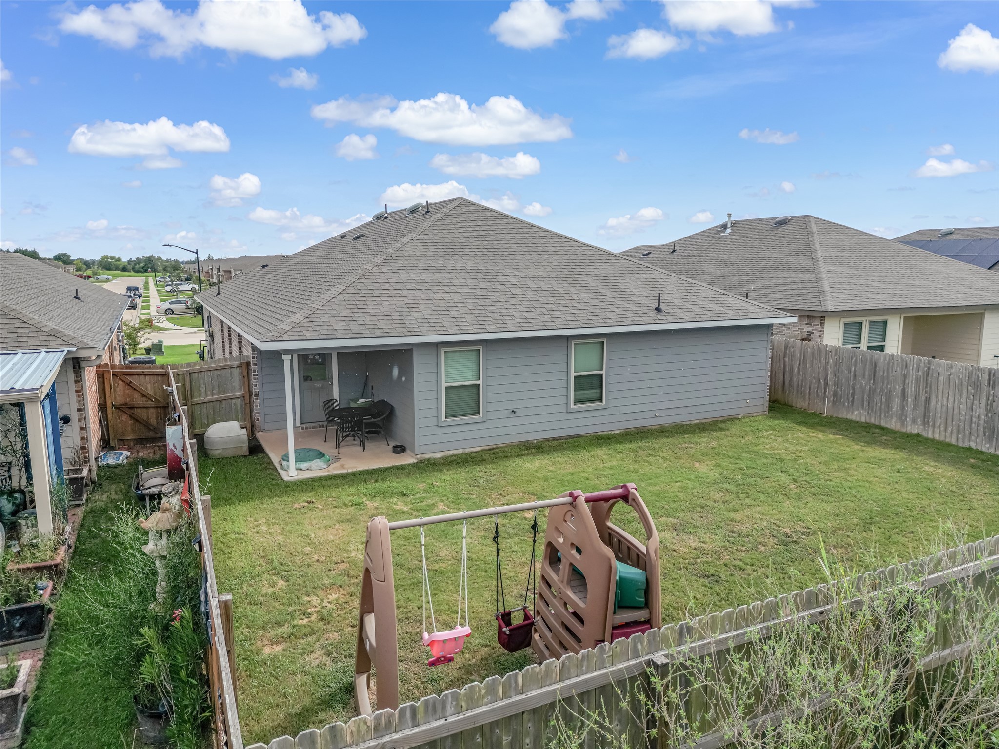 8022 Front Nine Lane Navasota, TX 77868 - Photo 29 of 30 a view of a house with a backyard