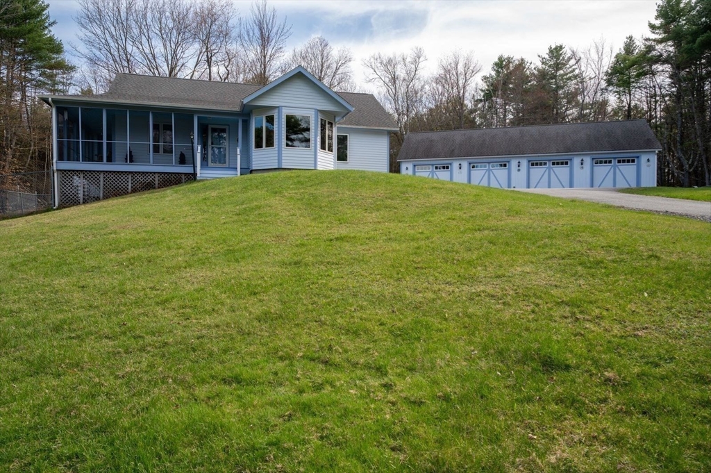 205 East Rindge Road Ashburnham, MA 01430 - Photo 5 of 40 front view of a house with a yard