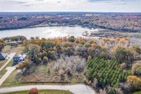 a view of a lake with mountain in the background