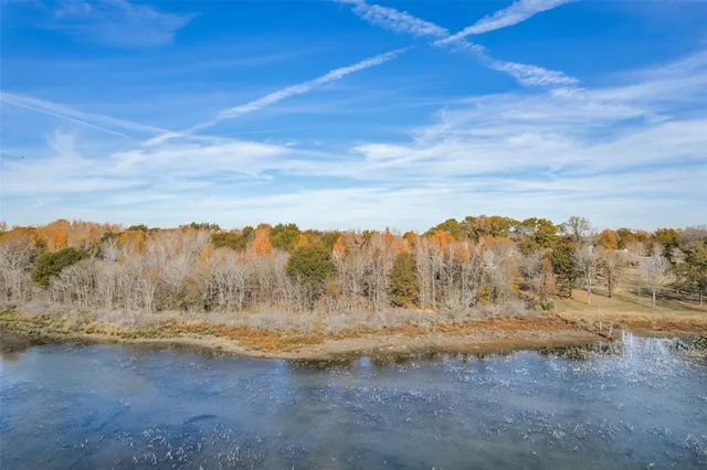 a view of mountain with lake view