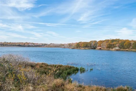 a view of lake with mountain