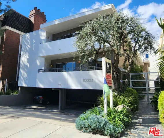 a view of house with yard