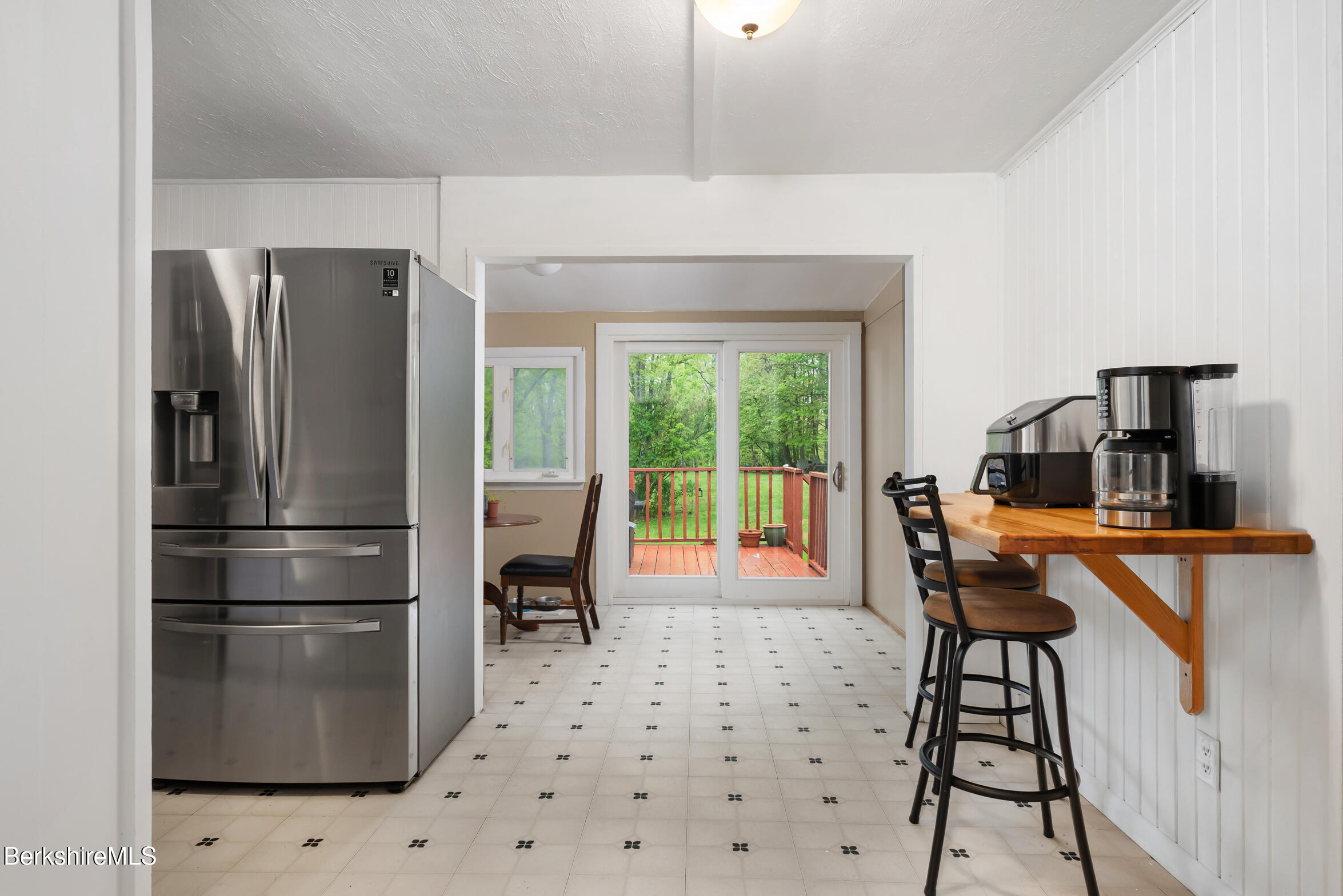 310 Luce Road Williamstown, MA 01267 - Photo 10 of 30 a kitchen with stainless steel appliances granite countertop a refrigerator and a stove top oven