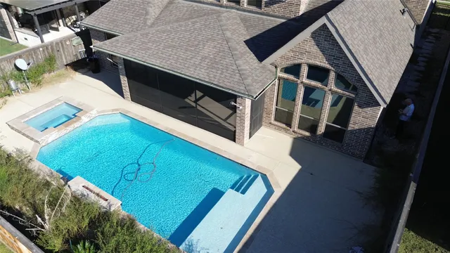 a terrace with a table and chairs