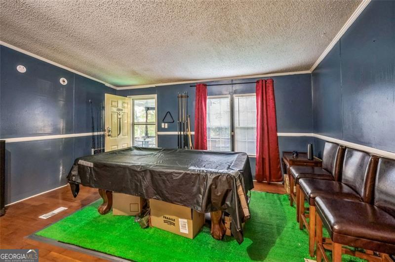 473 Haley Road Jackson, GA 30233 - Photo 13 of 13 a living room with furniture and a table