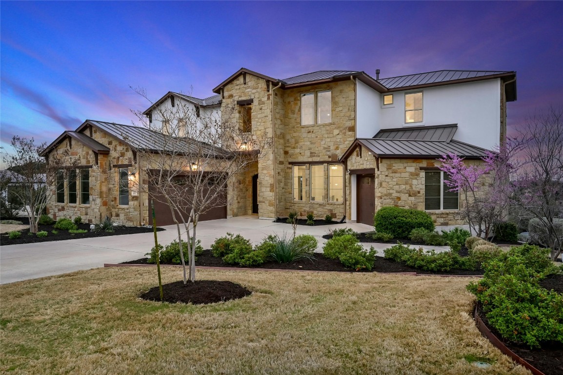 1112 Crestone Stream Drive Austin, TX 78738 - Photo 1 of 1 a front view of a house with a yard