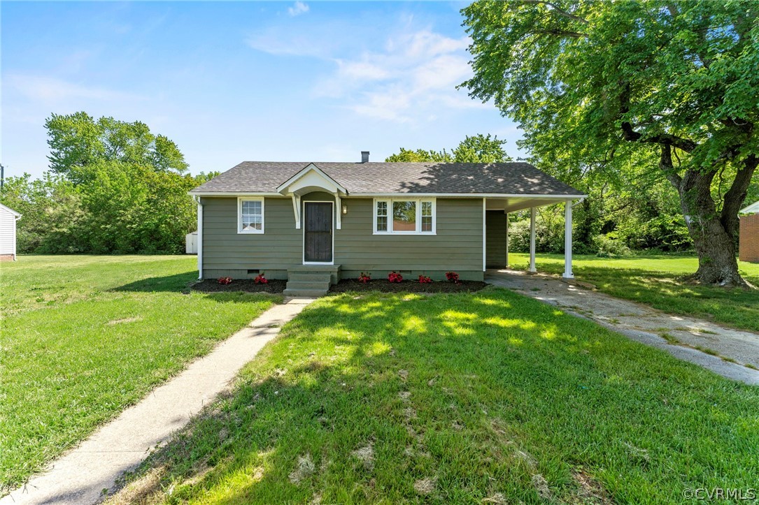 3319 Croydon Road Richmond, VA 23223 - Photo 1 of 22 a front view of a house with a garden