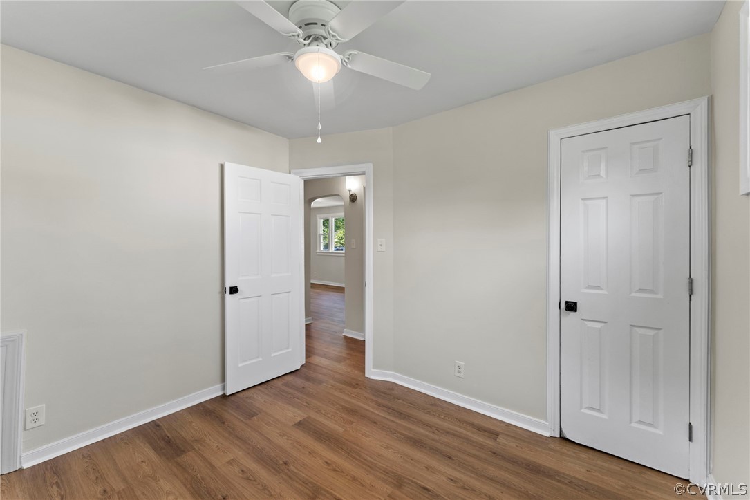 3319 Croydon Road Richmond, VA 23223 - Photo 18 of 22 a view of an empty room with wooden floor
