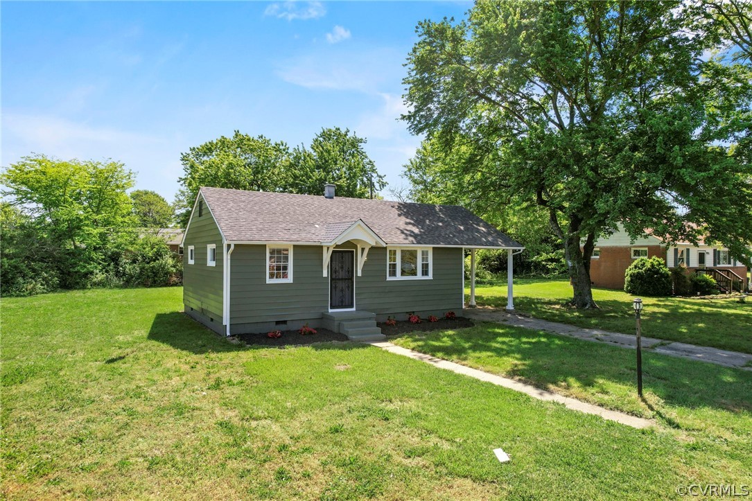 3319 Croydon Road Richmond, VA 23223 - Photo 2 of 22 a view of a house with a big yard