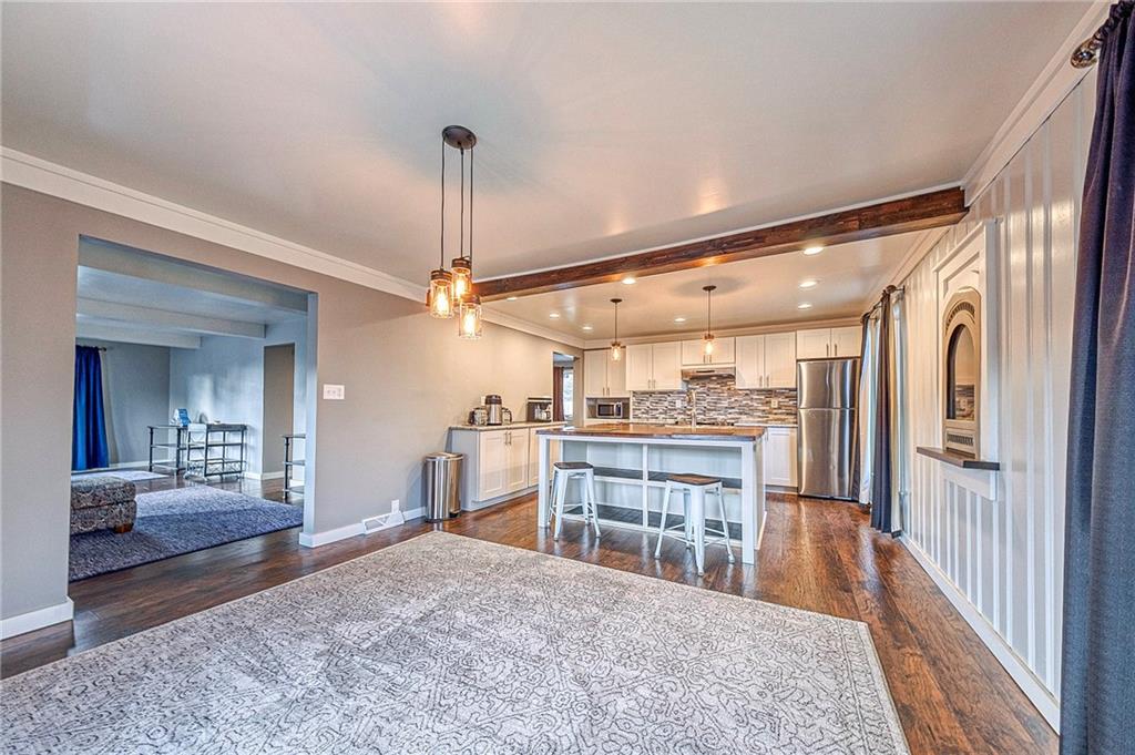 1440 Ohio Street Beaver, PA 15009 - Photo 11 of 36 a view of a dining room with furniture wooden floor and chandelier