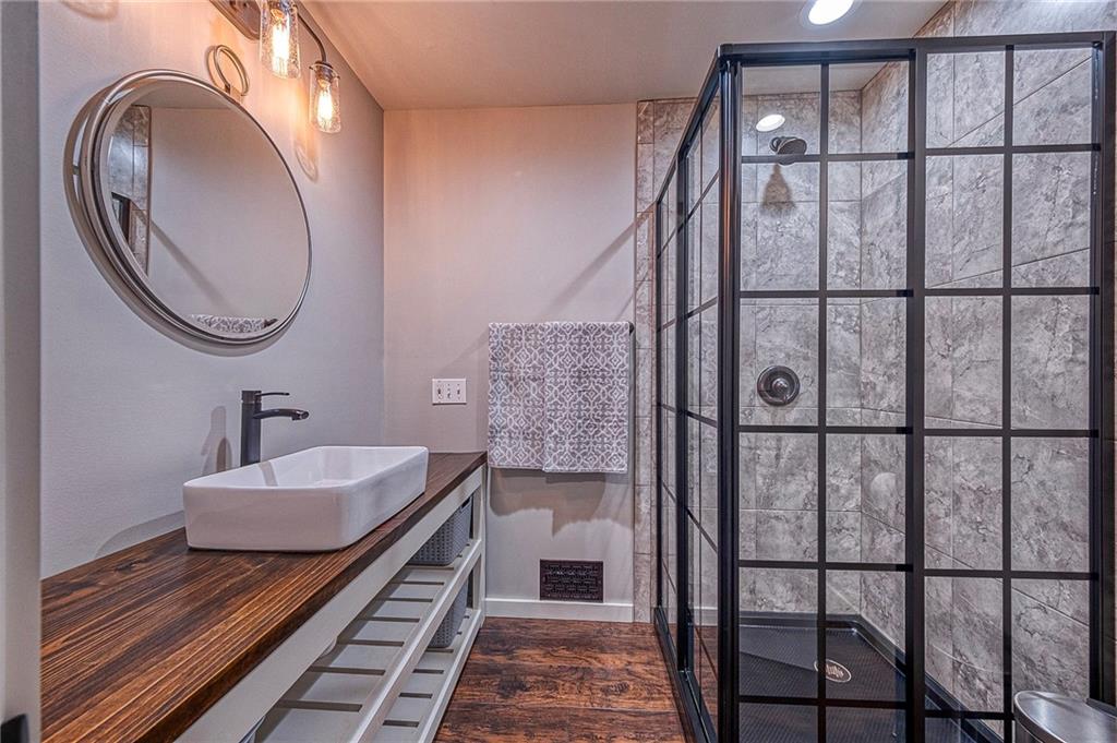 1440 Ohio Street Beaver, PA 15009 - Photo 17 of 36 a bathroom with a sink and a mirror