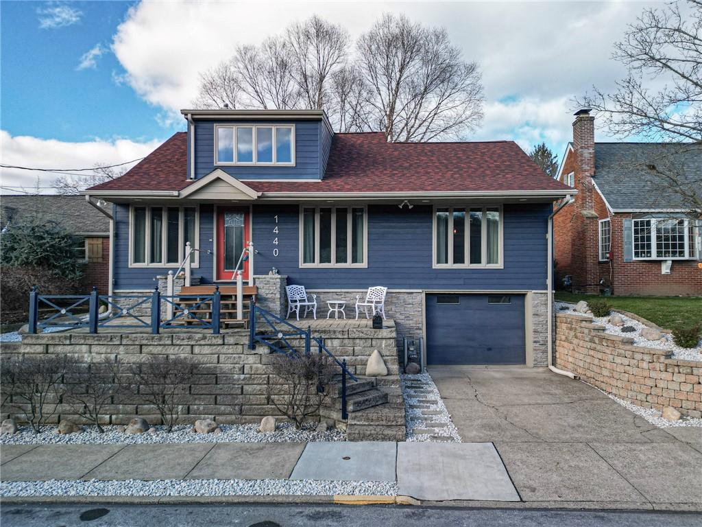1440 Ohio Street Beaver, PA 15009 - Photo 2 of 36 a view of a brick house with many windows