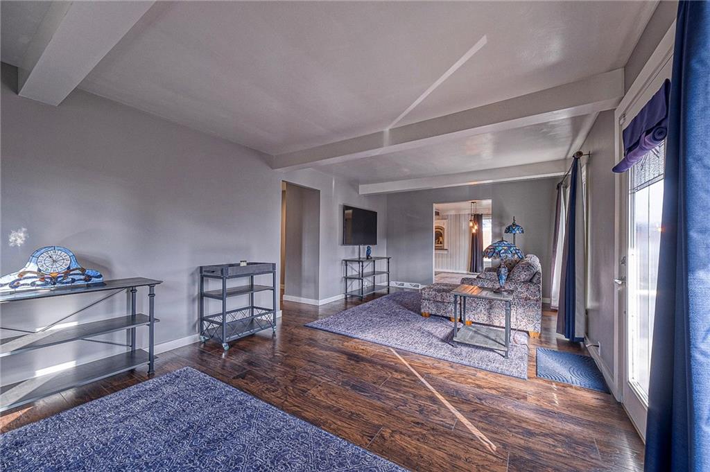 1440 Ohio Street Beaver, PA 15009 - Photo 3 of 36 a view of a livingroom with furniture wooden floor and a rug