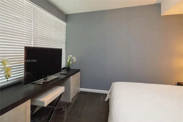 a workspace with furniture and a window