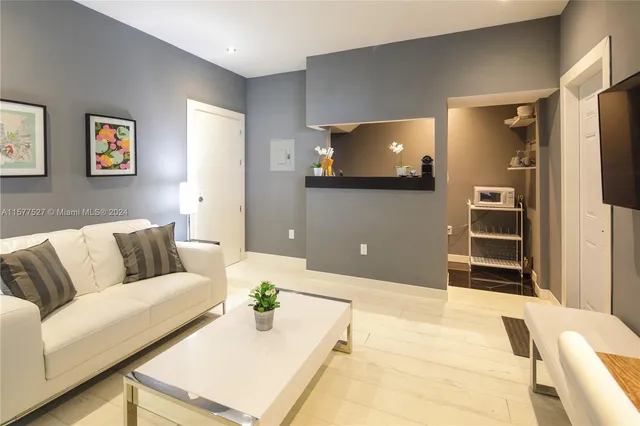 a view of a bathroom from a hallway