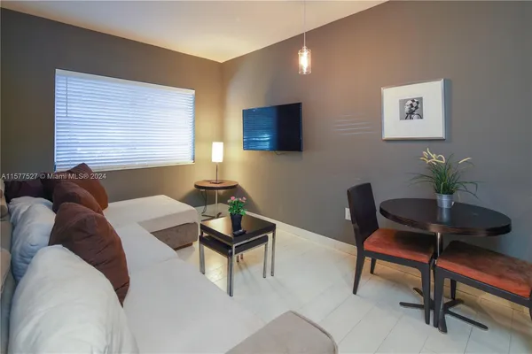 a view of a street with a building in the background