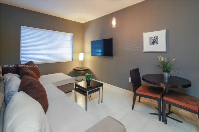 a view of a street with a building in the background