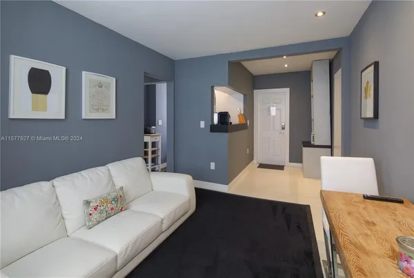 a living room with a couch and a table